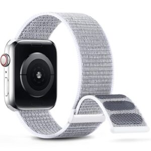 A grey material smart watch band with a white strap.