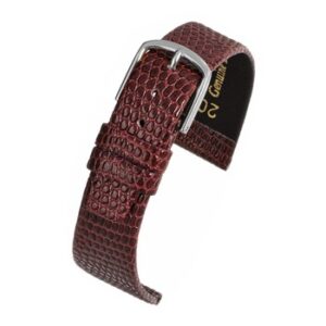 A burgundy lizard grain strap (G) with a silver buckle.