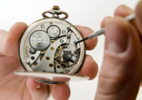 Watchmaker,Holding,Antique,Pocket,Watch,Show,The,Clockwork,Mechanism,And